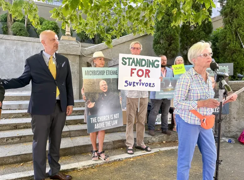 Mary Dispenza Seattle Times 2024 All of us are mandated reporters when it comes to crimes against children, writes the author, Mary Dispenza, pictured speaking in front of St. James Cathedral in Seattle. (Catalina Gaitán / The Seattle Times, 2024)