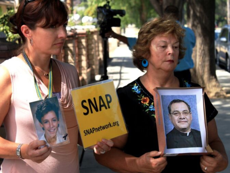 Joelle Casteix (L) at a news conference announcing lawsuits against Fr. Alex Castillo and the Roman Catholic Diocese of San Bernardino. (KPCC)