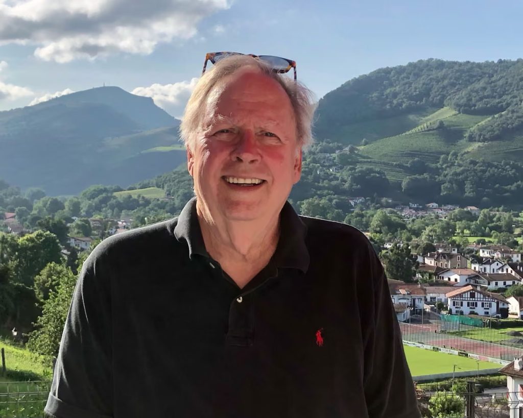 Ray Mouton, in front of the French mountain village where he spent much of his later years, in an undated photo. Photograph: Courtesy of Ray Mouton's family