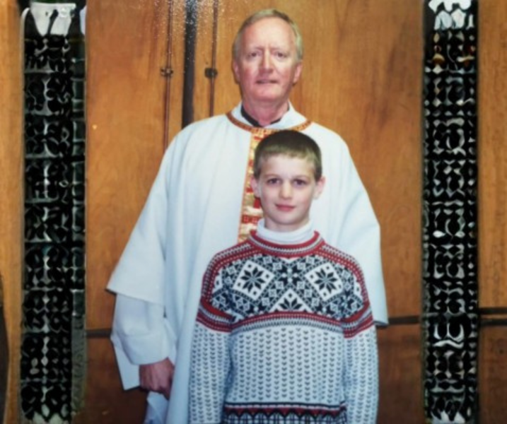 Trevor Martin and Father Kelly Father Michael Kelly and 10-year-old Trevor Martin
